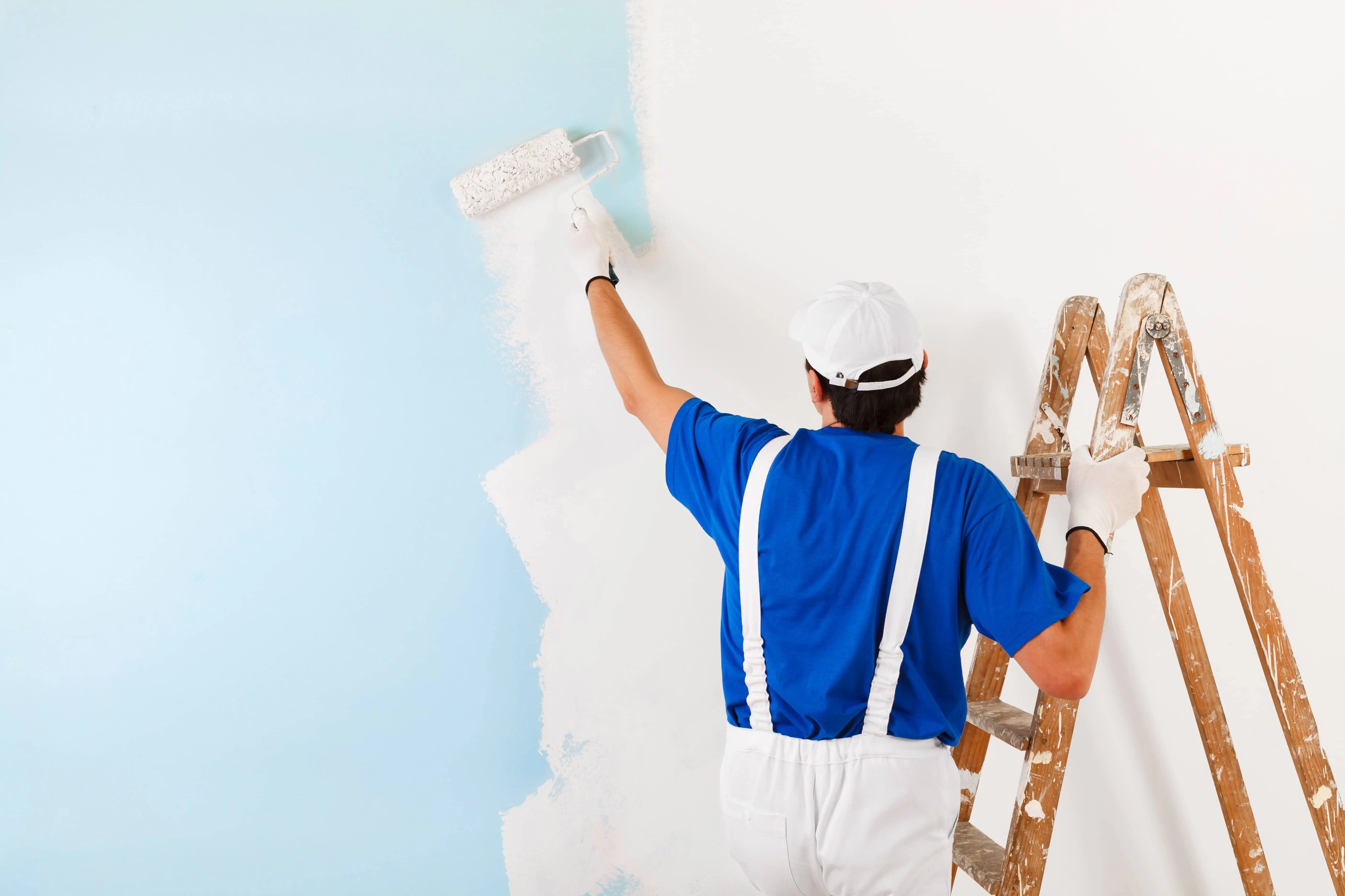 Man painting wall